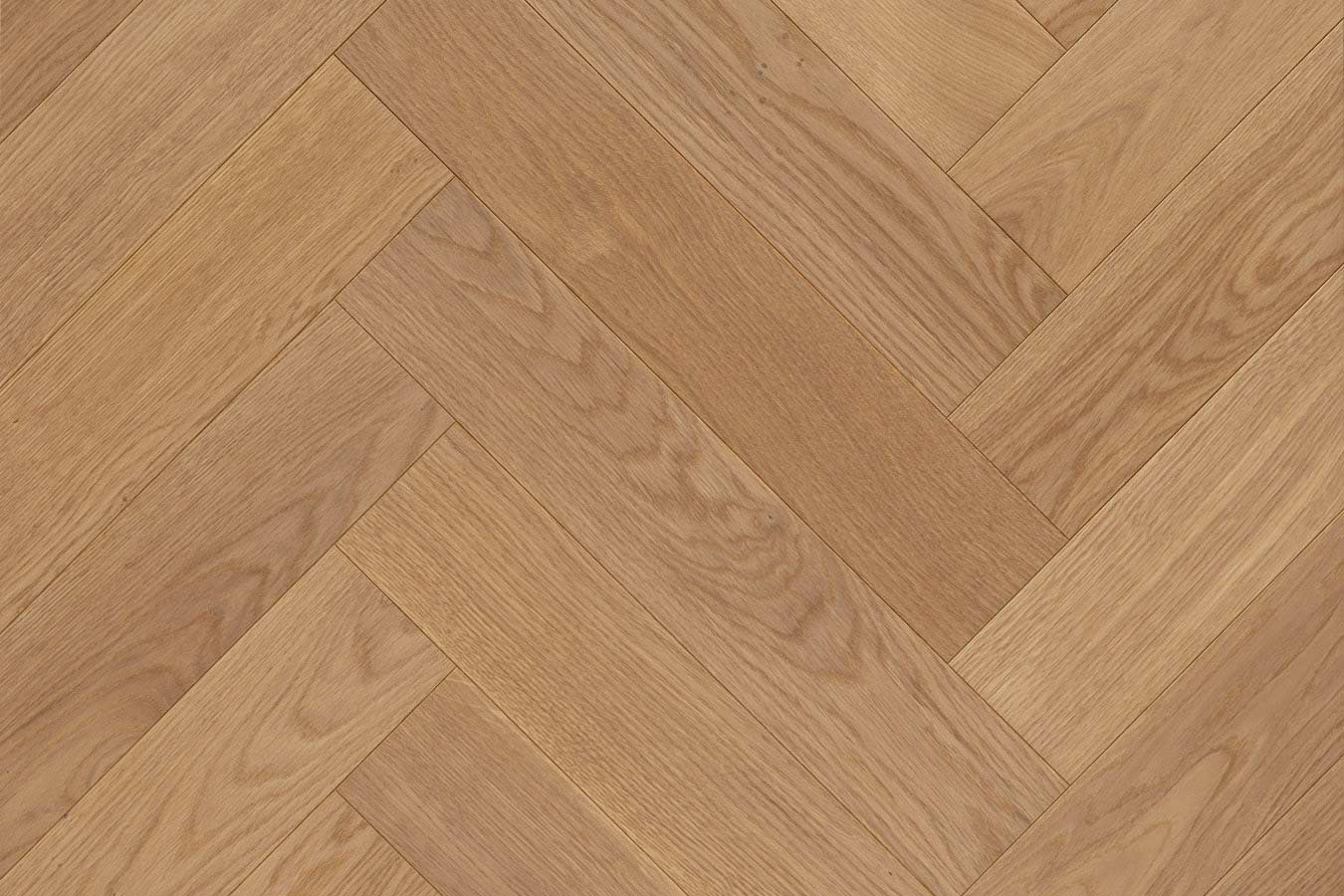 Primer plano del parquet en espiga FRV Comfort de roble sin nudo utilizado en el proyecto de oficinas.