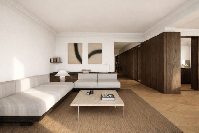 Parquet en espiga de madera natural en el salón de una vivienda reformada en la calle Muntaner de Barcelona