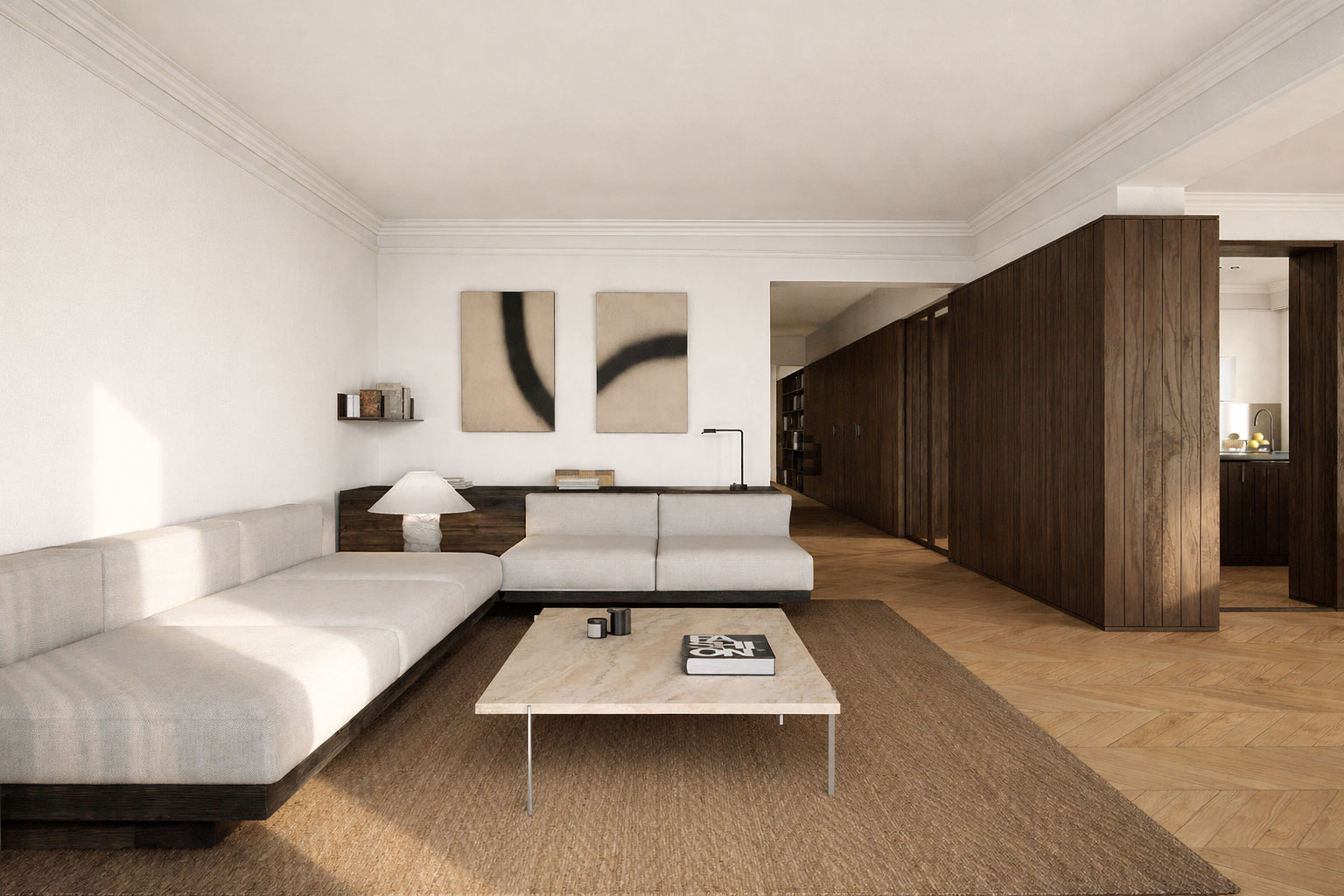 Parquet en espiga de madera natural en el salón de una vivienda reformada en la calle Muntaner de Barcelona